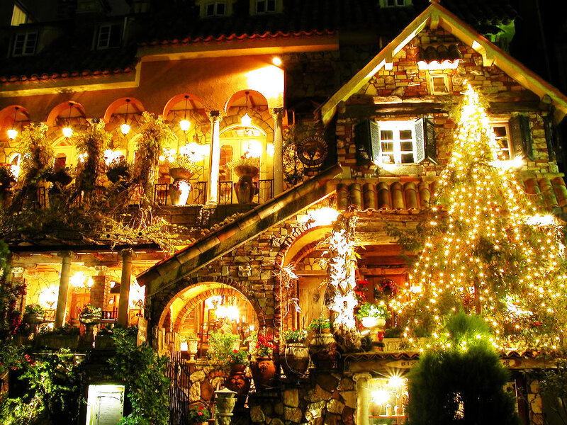 Christmas lights on a stone house