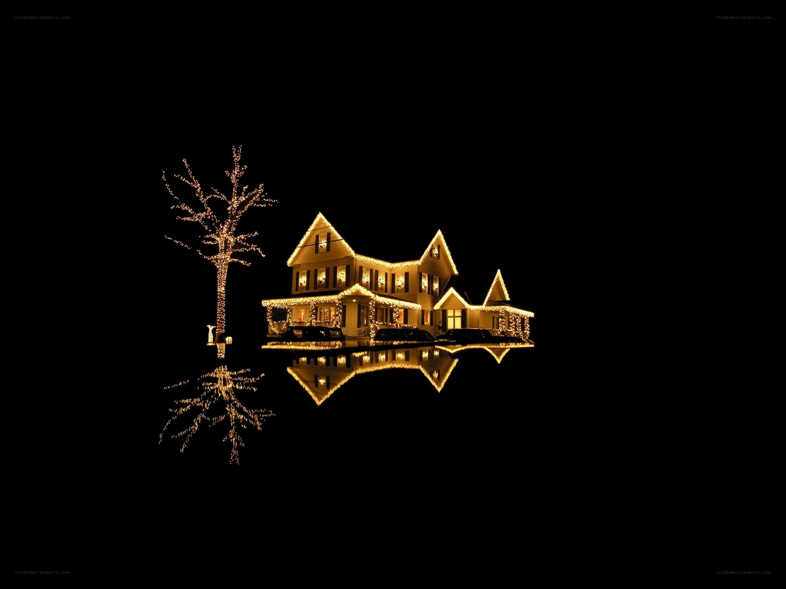 Christmas lights on house at night