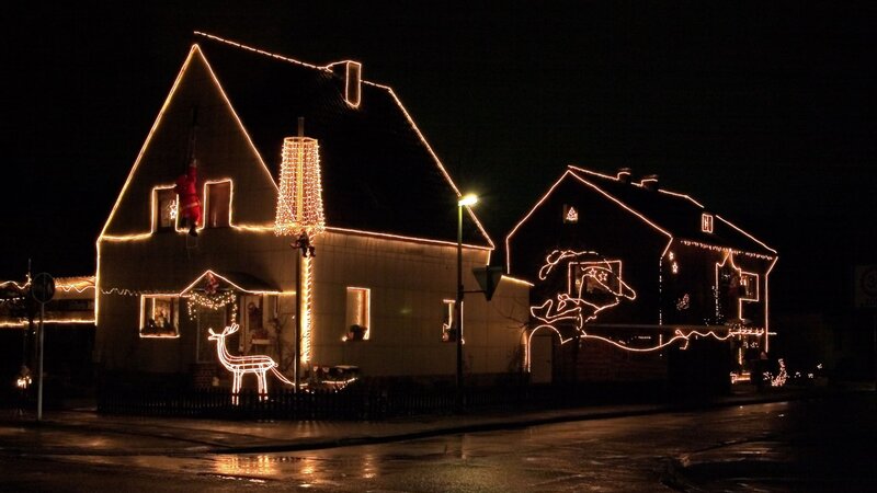 Christmas lights on houses at night