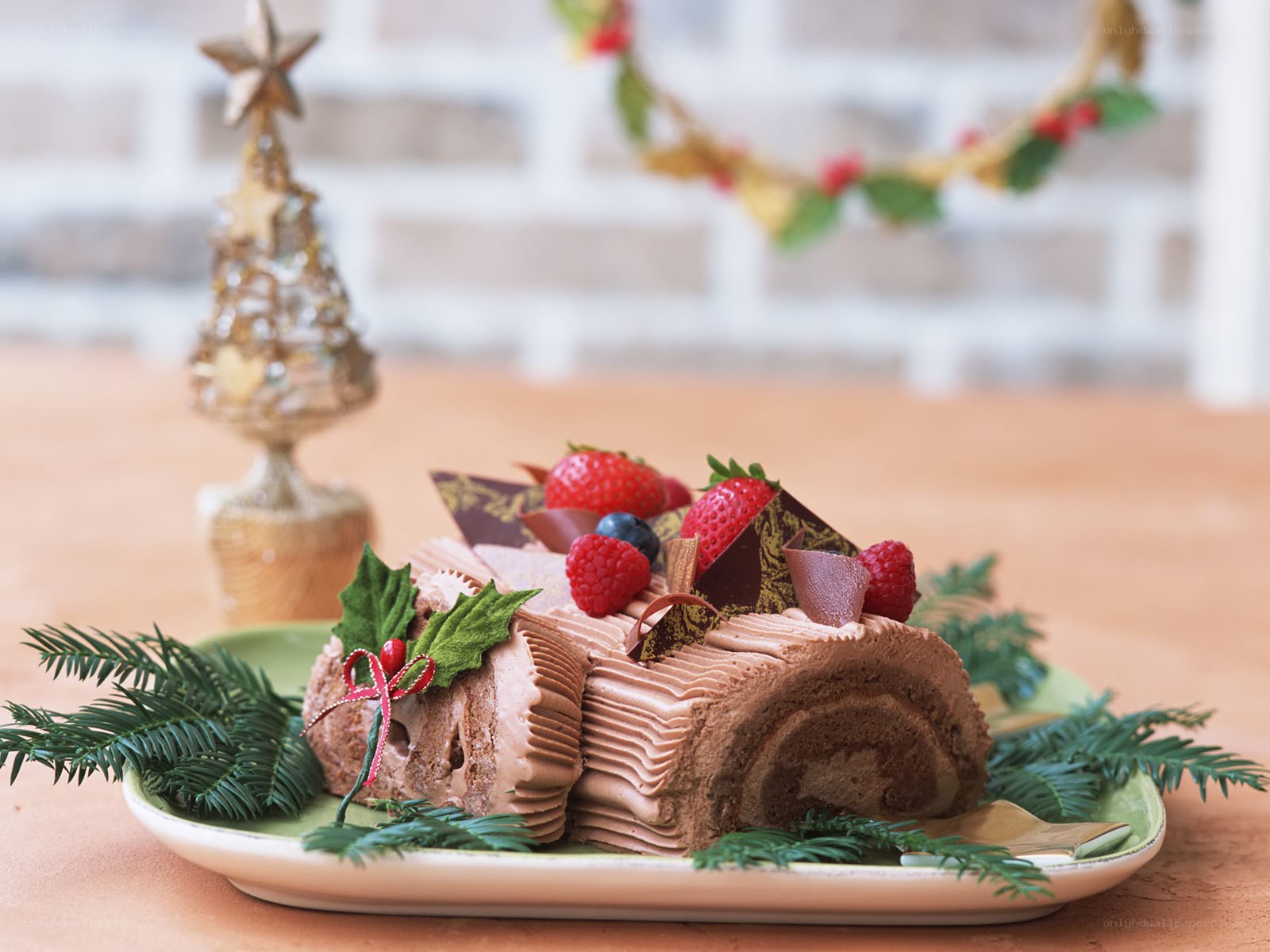 Christmas log cake with berries
