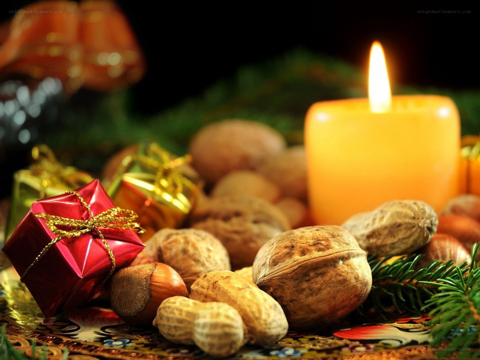 Christmas nuts and candle