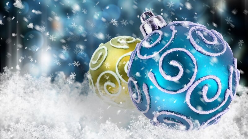 Christmas ornaments in snow