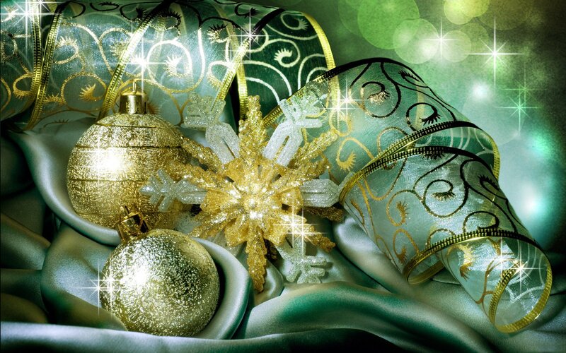 Christmas ornaments on green fabric