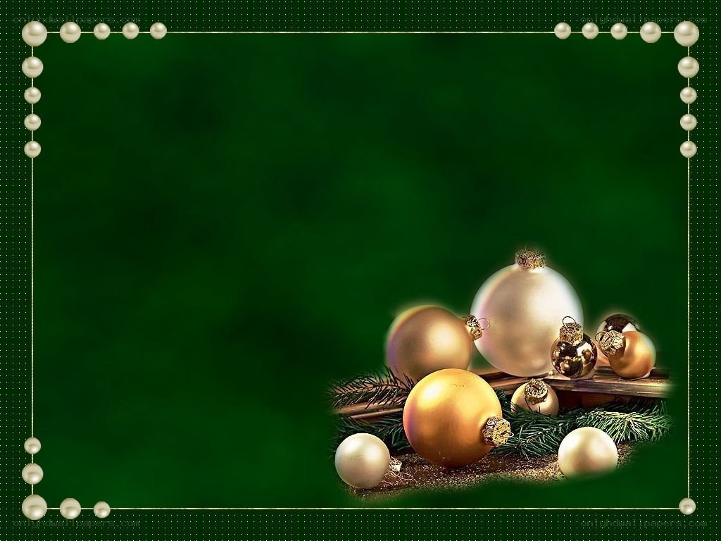 Christmas ornaments on green