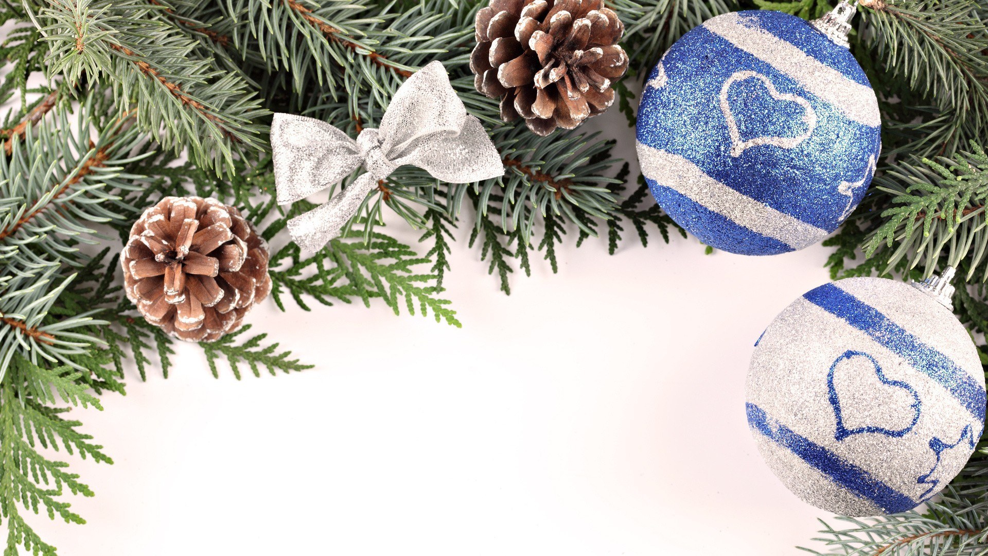 Christmas ornaments on pine branches