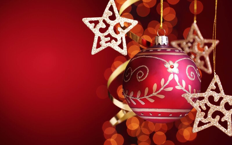 Christmas ornaments on red background