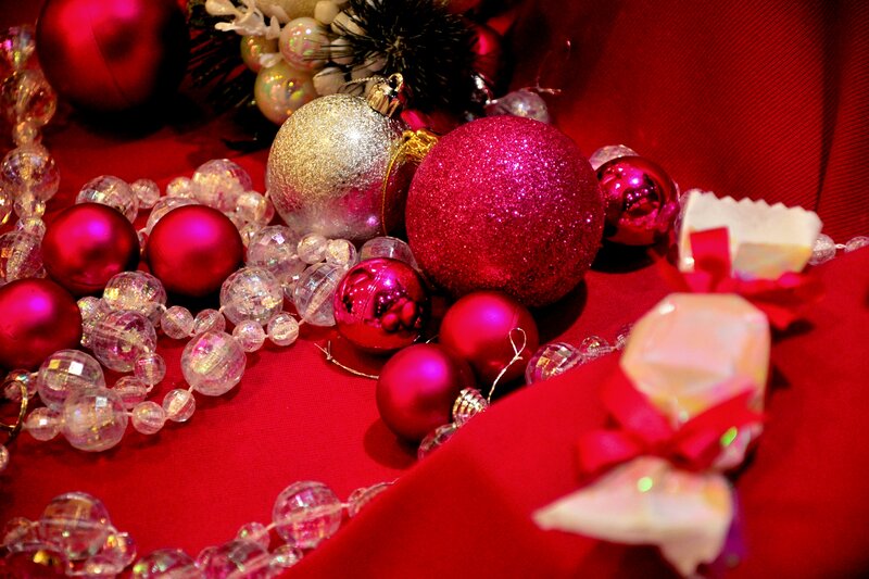 Christmas Ornaments on Red Cloth