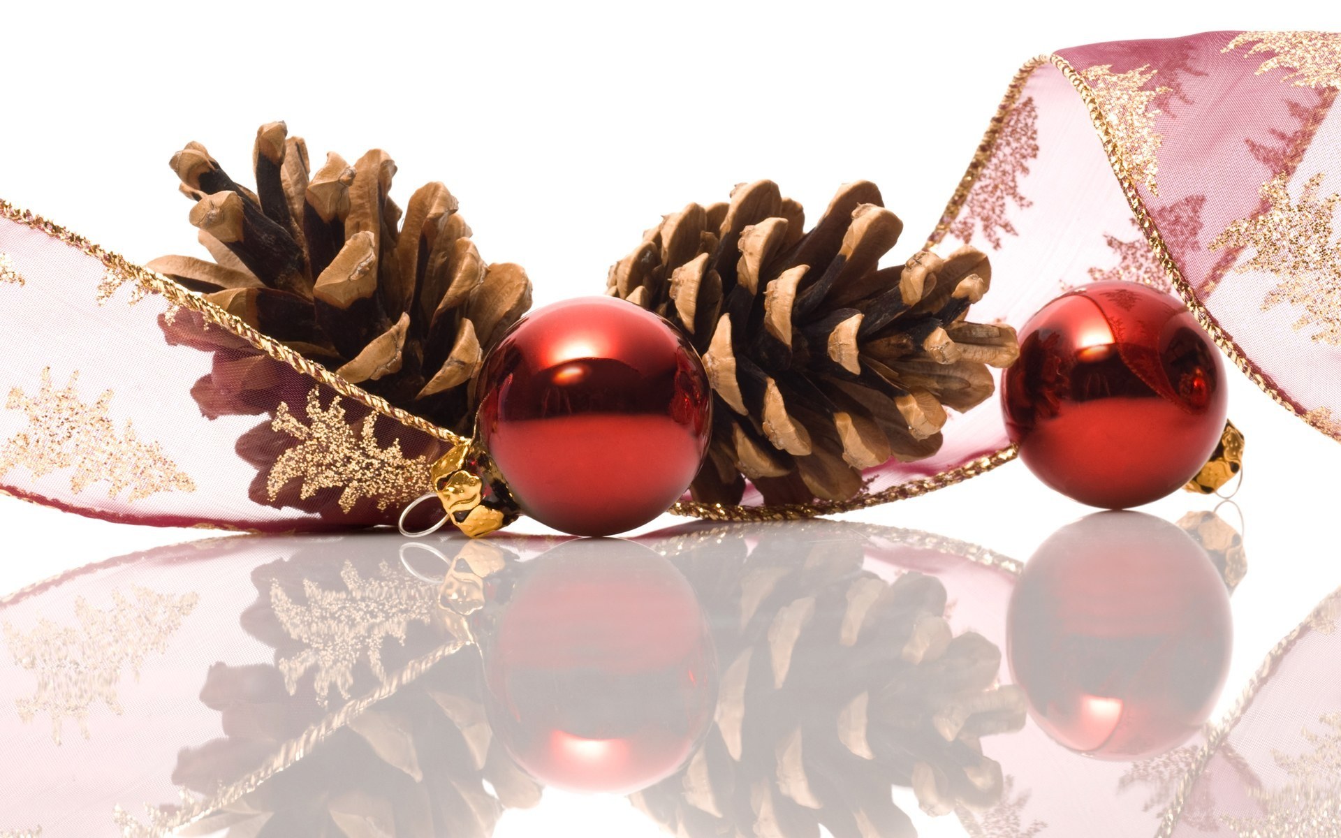 Christmas ornaments on reflective surface