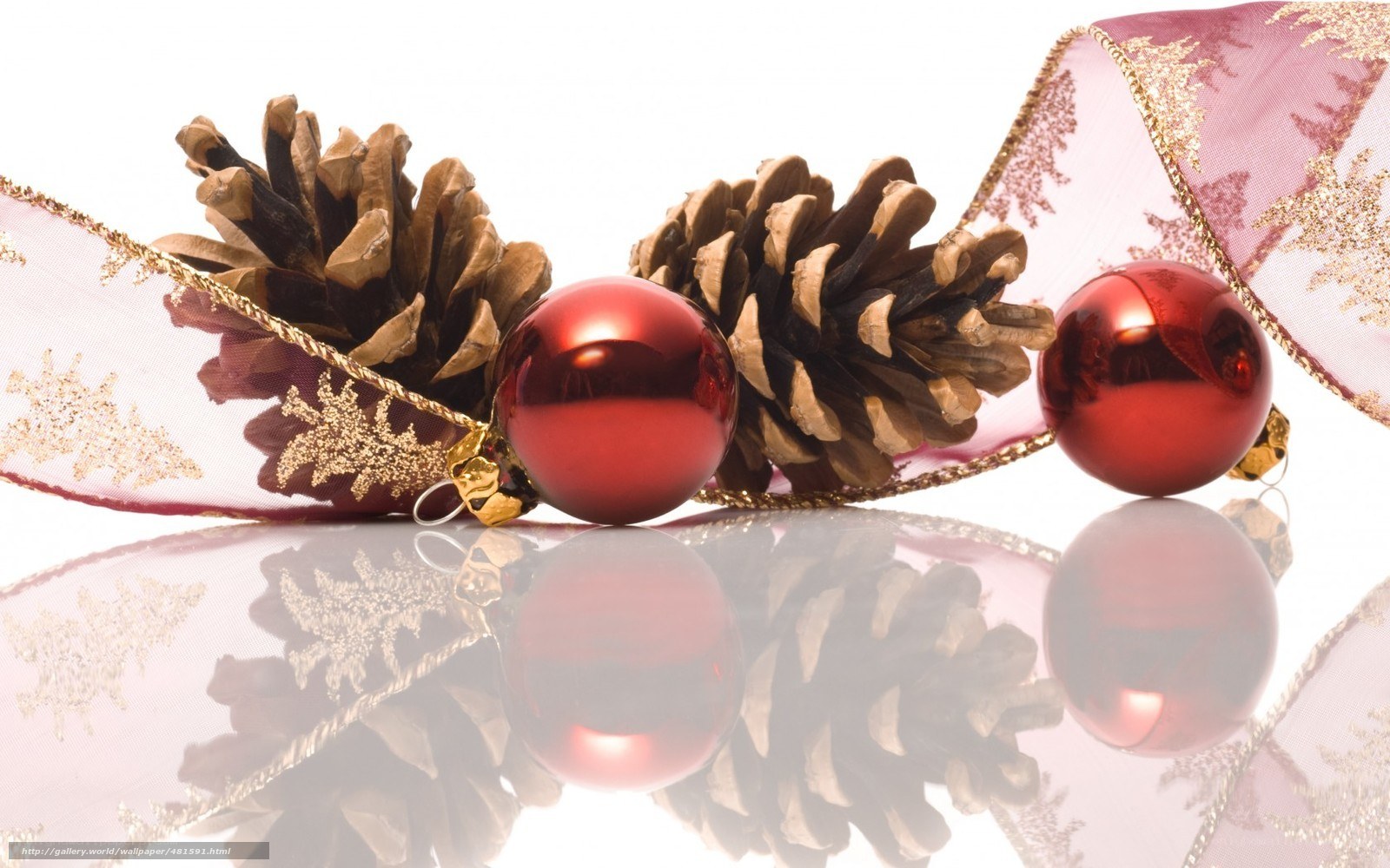 Christmas ornaments on reflective surface