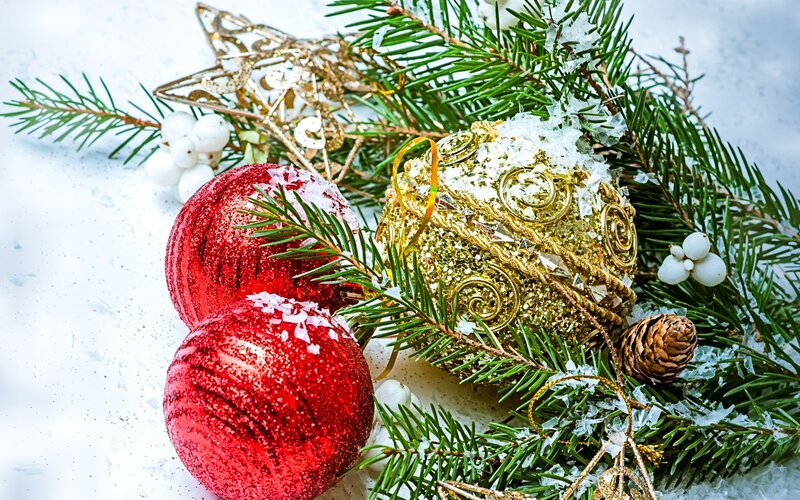Christmas ornaments on snow