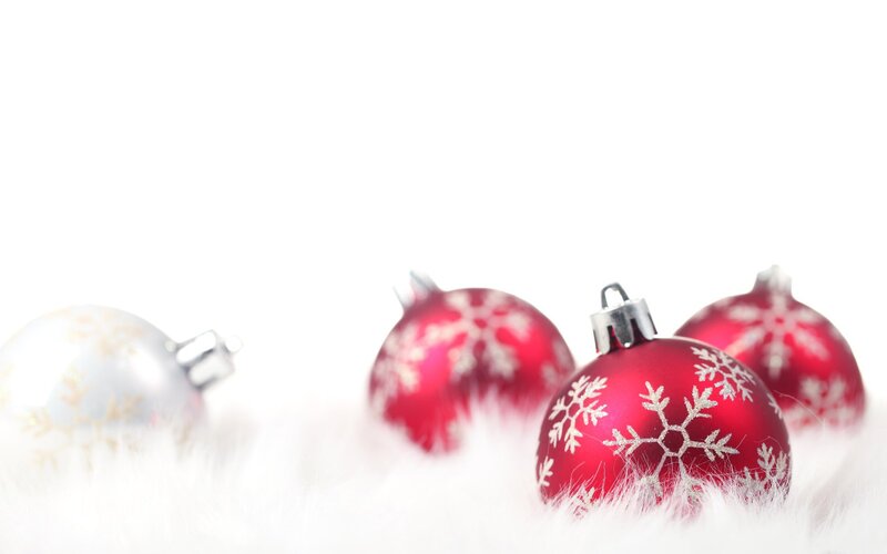 Christmas ornaments on white fur