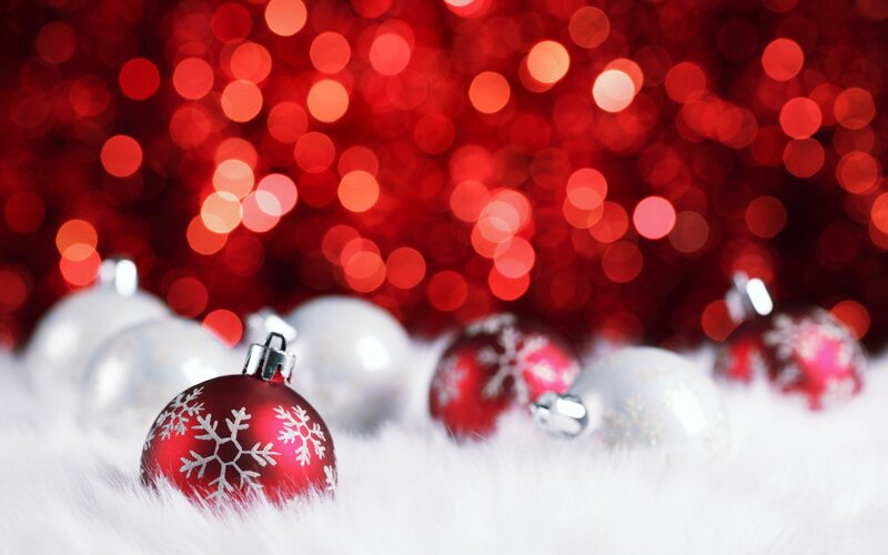 Christmas ornaments on white fur