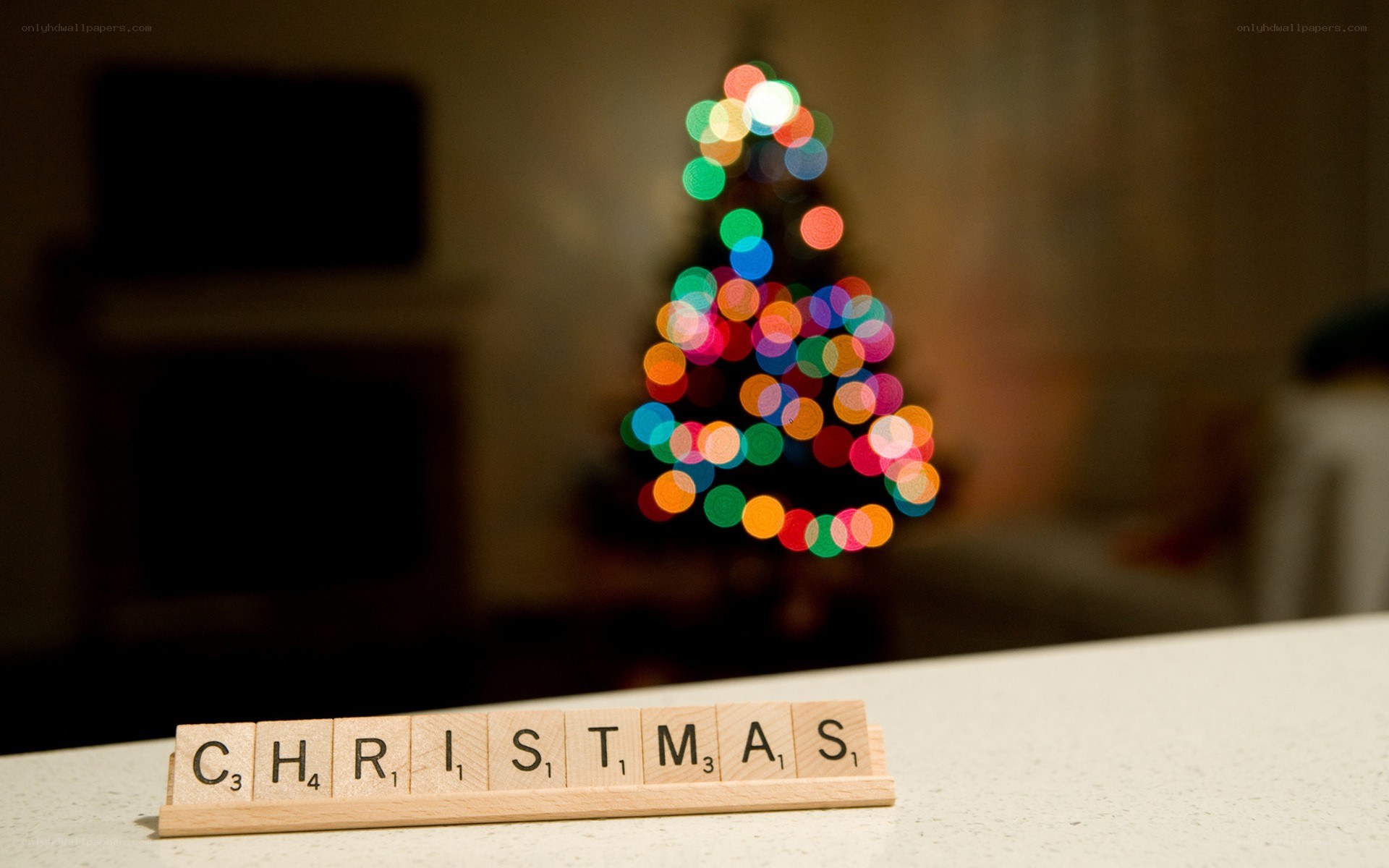 Christmas scrabble tiles with tree lights