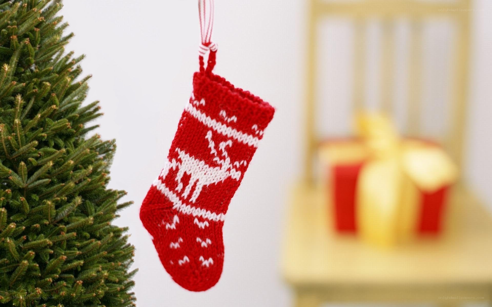 Christmas stocking hanging near tree