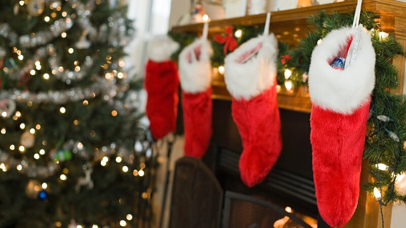 Christmas stockings by fireplace