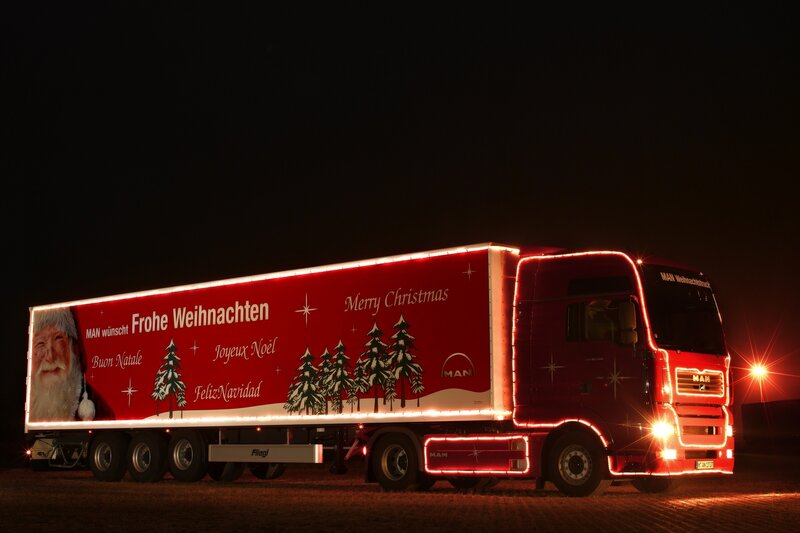 Christmas-themed truck at night