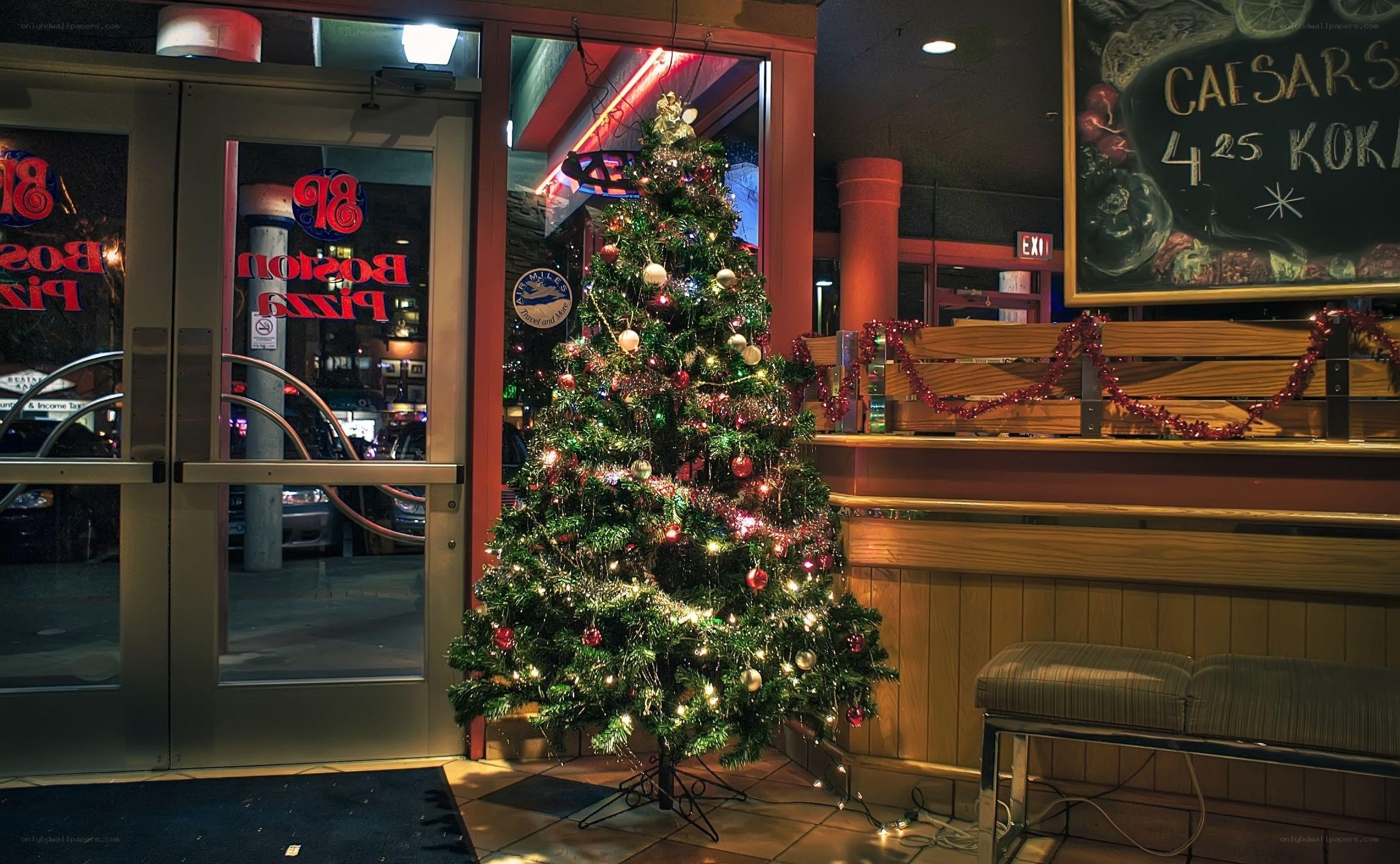 Christmas tree at restaurant entrance