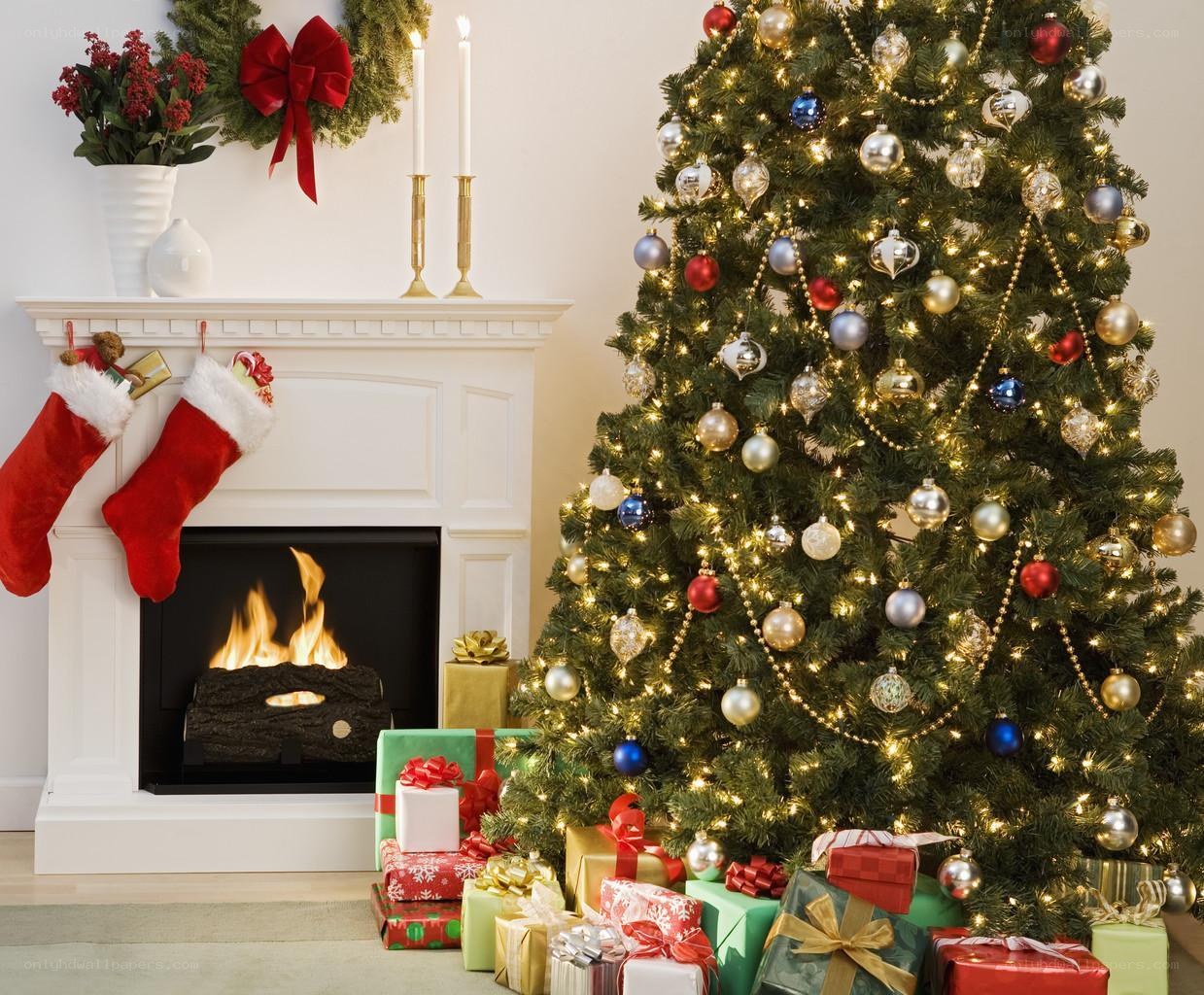 Christmas tree by fireplace