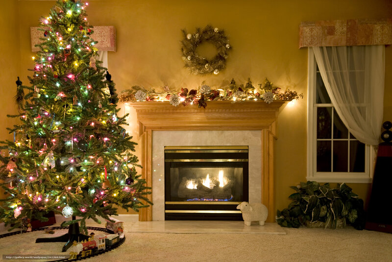 Christmas tree by fireplace
