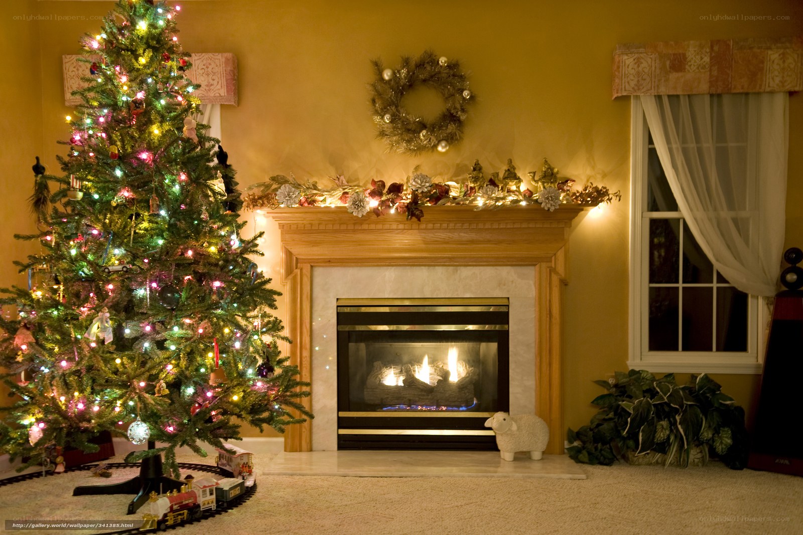 Christmas tree by fireplace