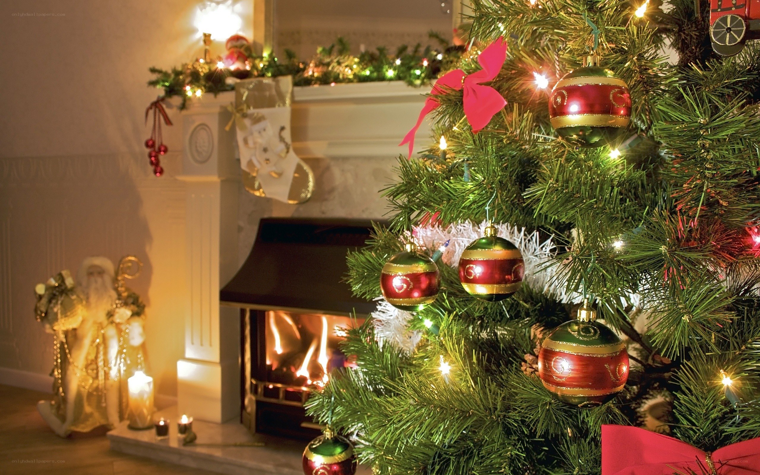 Christmas tree by fireplace