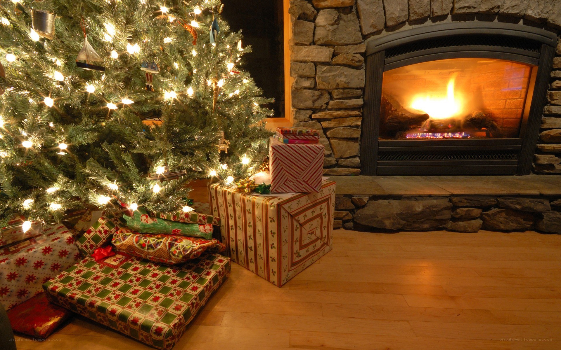 Christmas tree by fireplace
