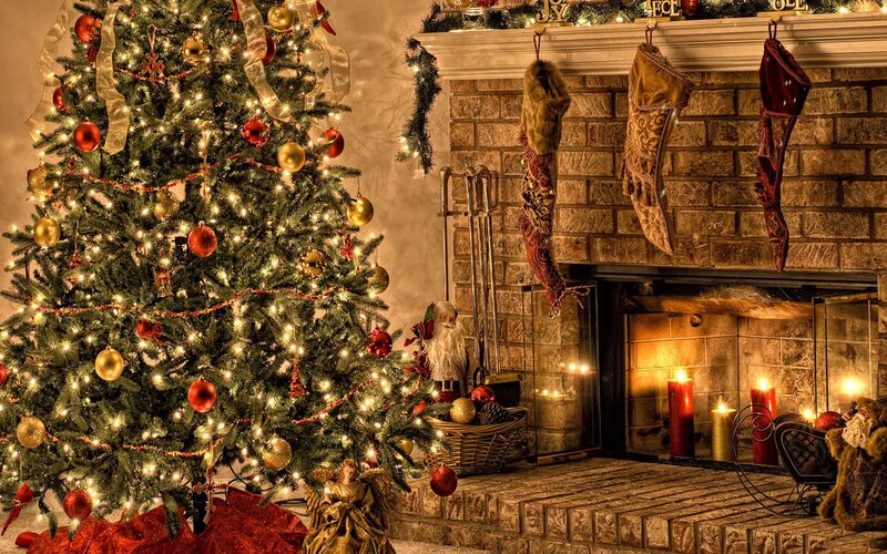 Christmas tree by fireplace