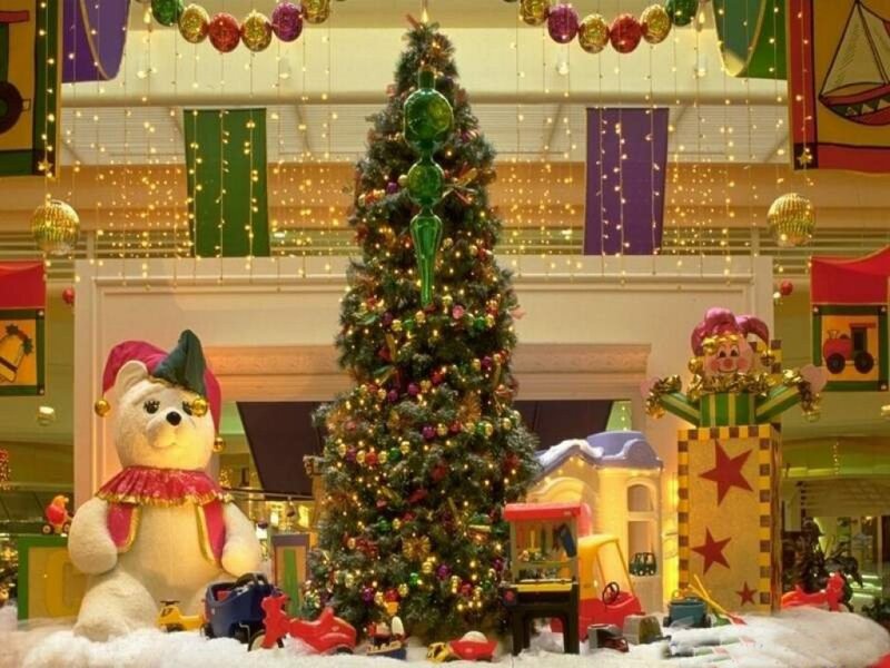 Christmas Tree Display — Green, Festive, Winter, Photograph, Bear Statue
