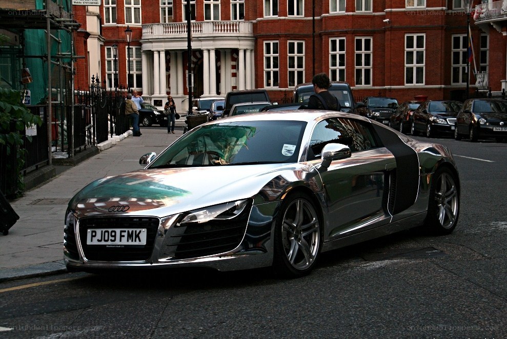 Chrome Audi R8 on city street