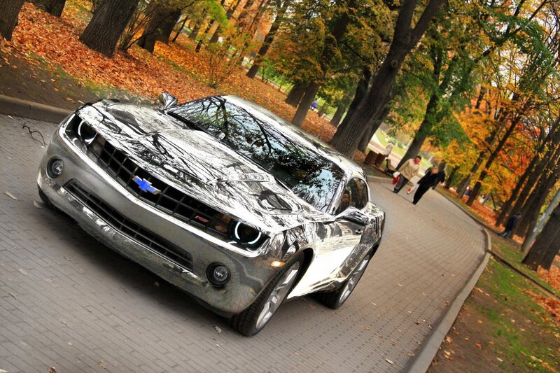 Chrome car in autumn park