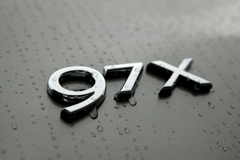 Chrome Emblem on Wet Surface