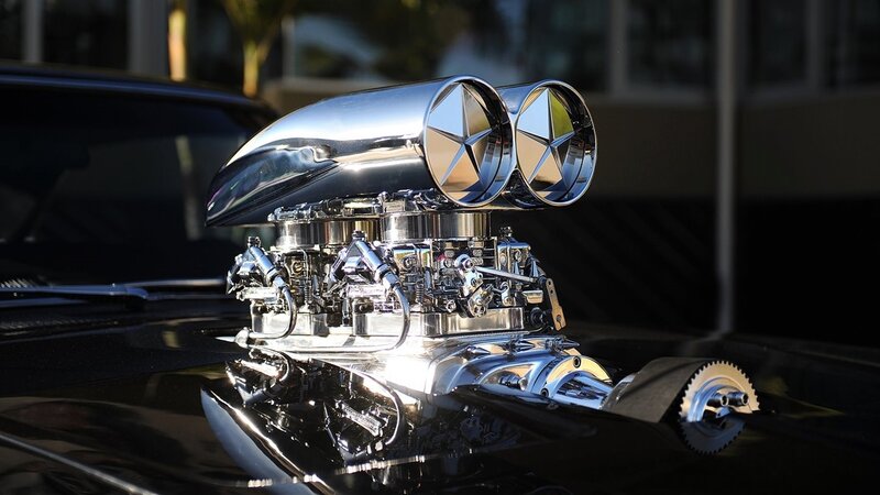 Chrome Engine on Black Car