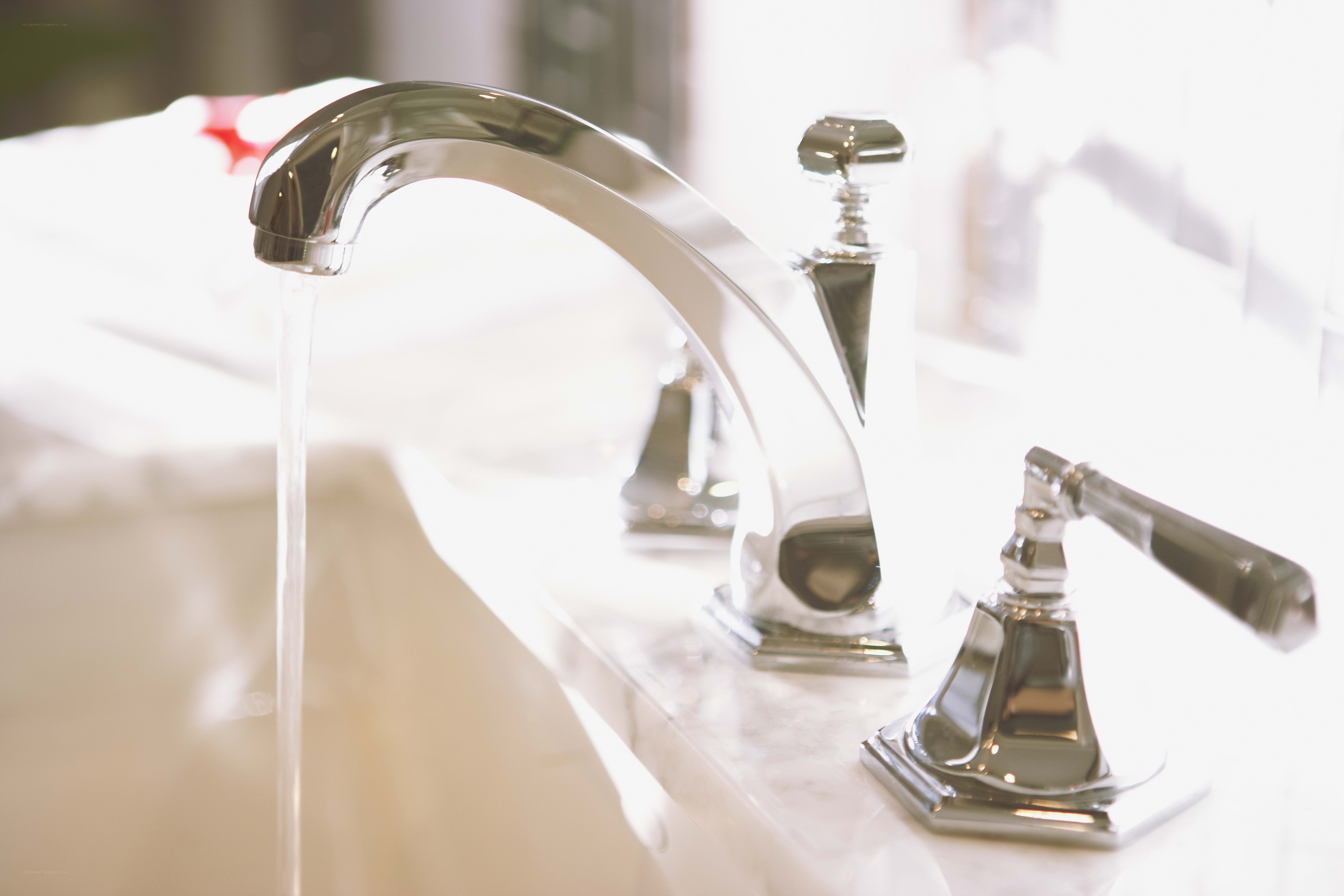 chrome faucet with running water