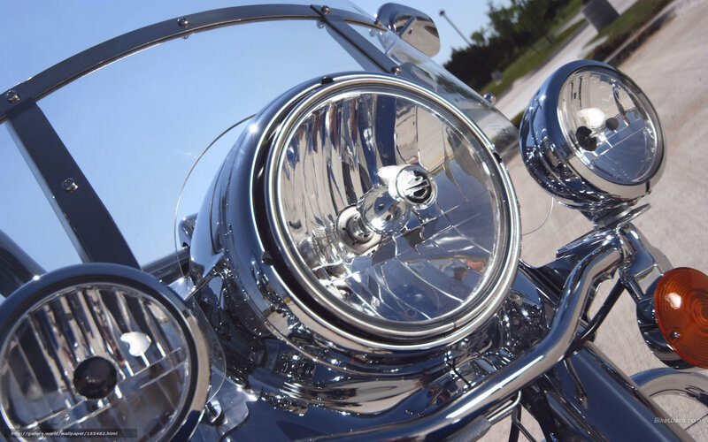 Chrome motorcycle headlight close-up