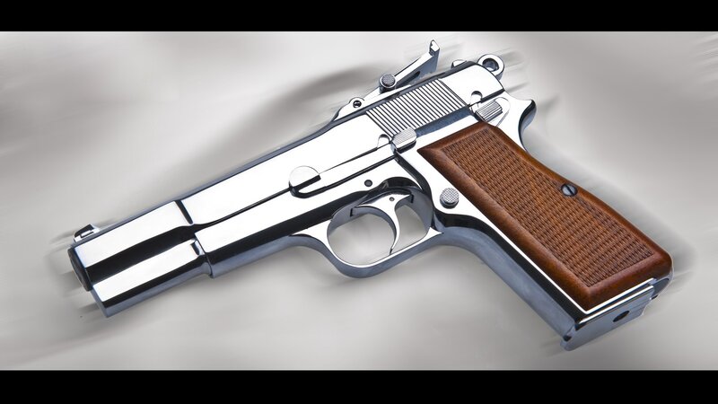 chrome pistol with wooden grip