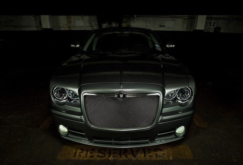 Chrysler in a dimly lit garage