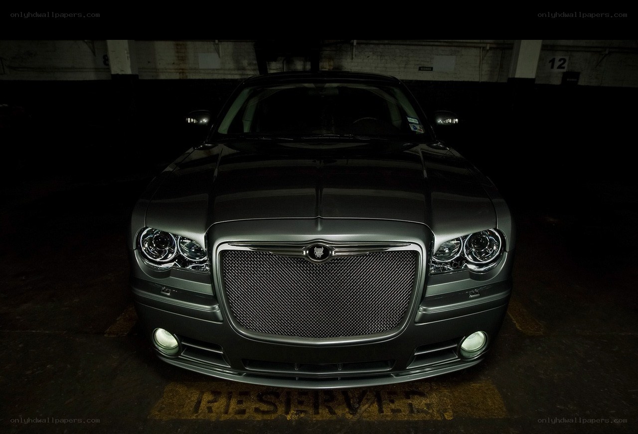 Chrysler in a dimly lit garage