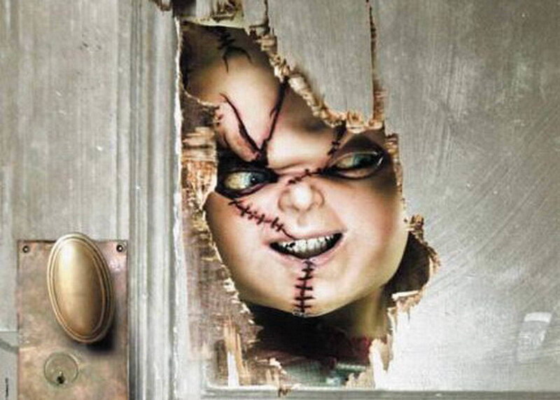 Chucky breaking through a door