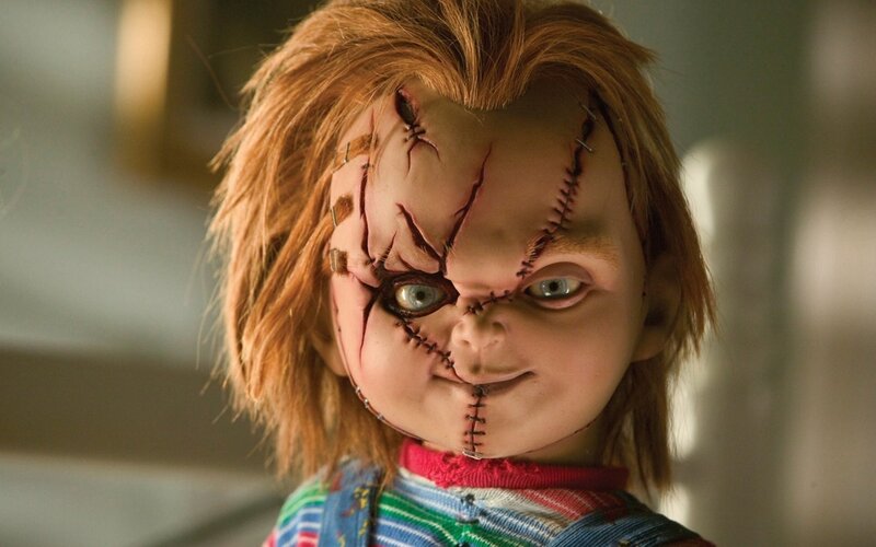 Chucky doll with stitched face