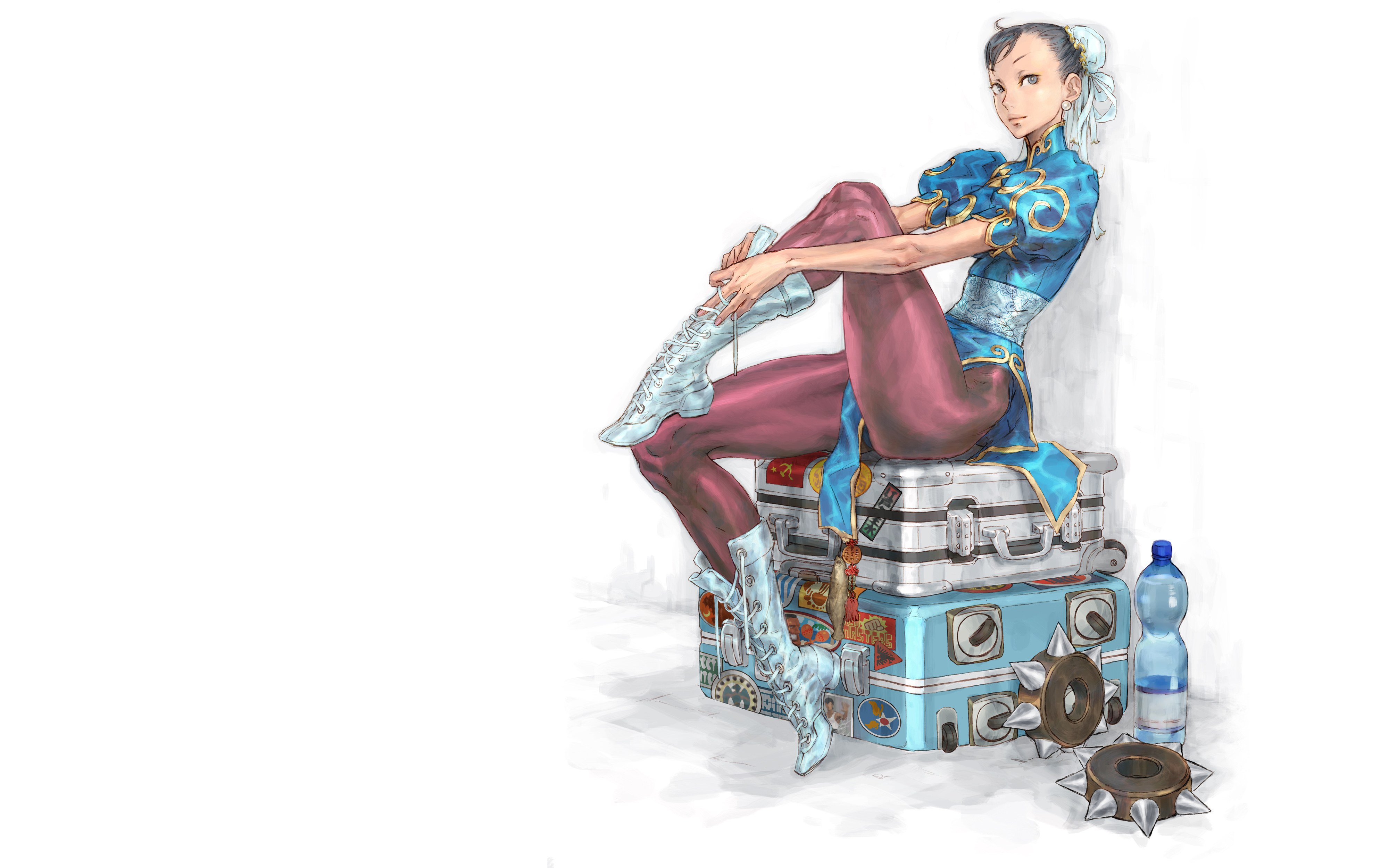 Chun-Li sitting on suitcases