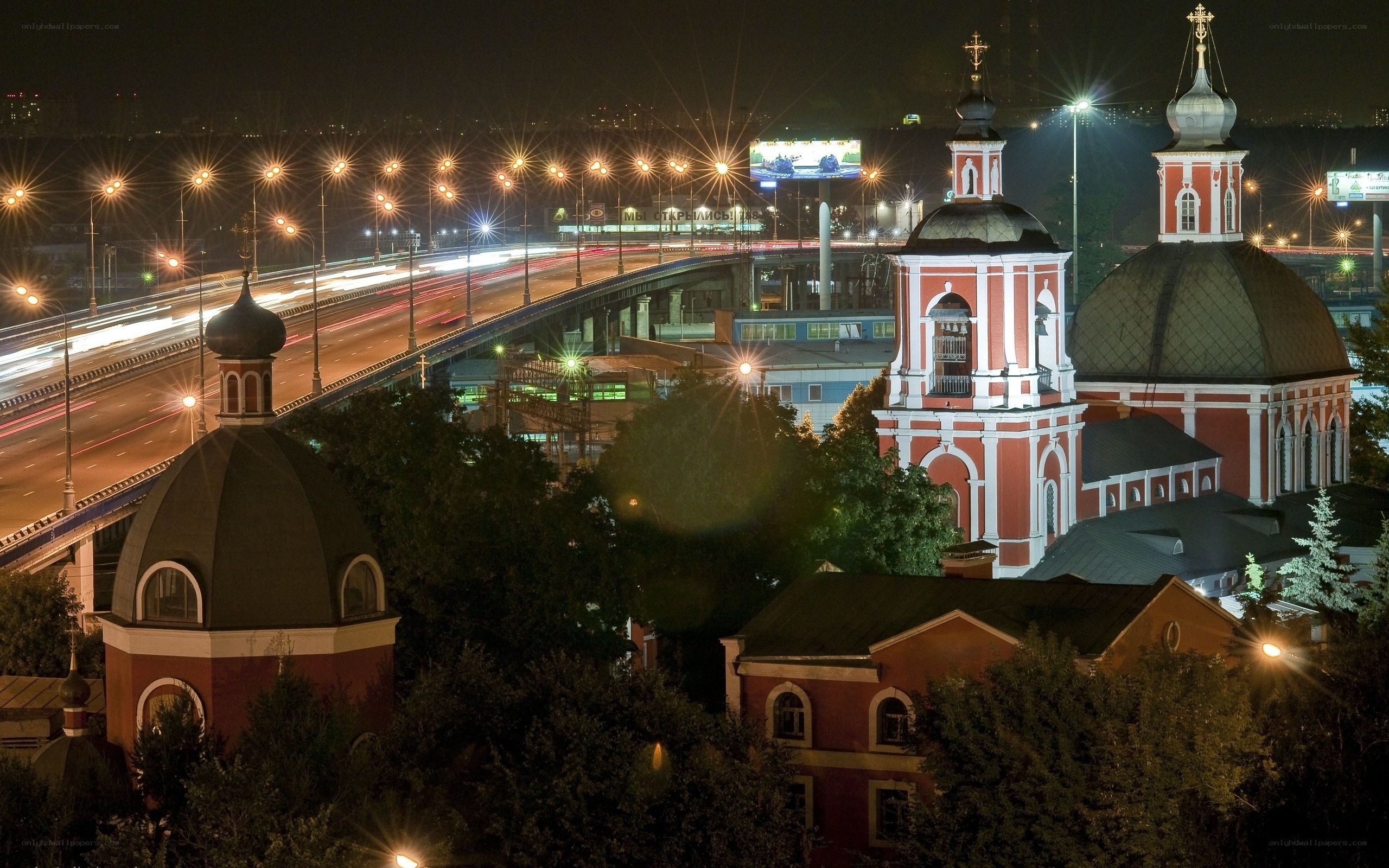 Church and bridge at night