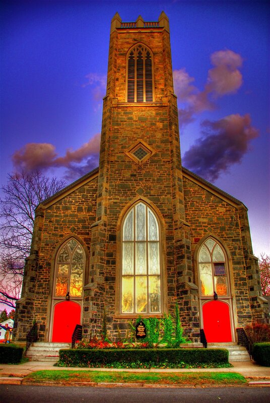 Church at dusk with red doors