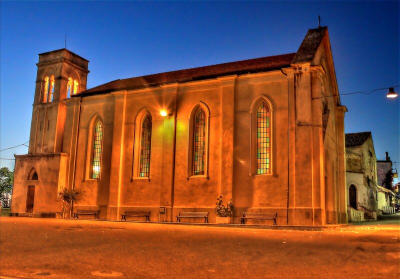 Church at dusk with stained glass