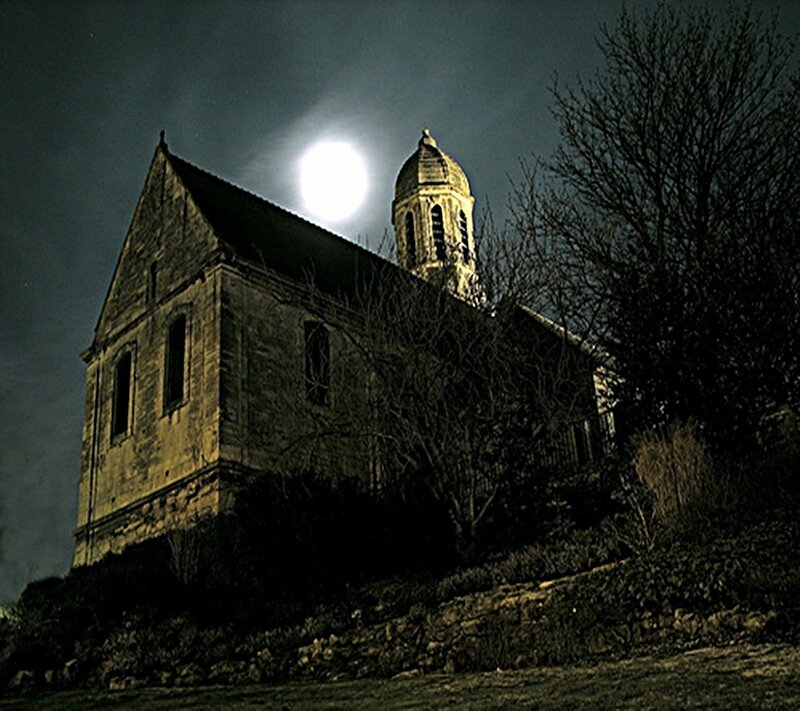 Church at night under full moon