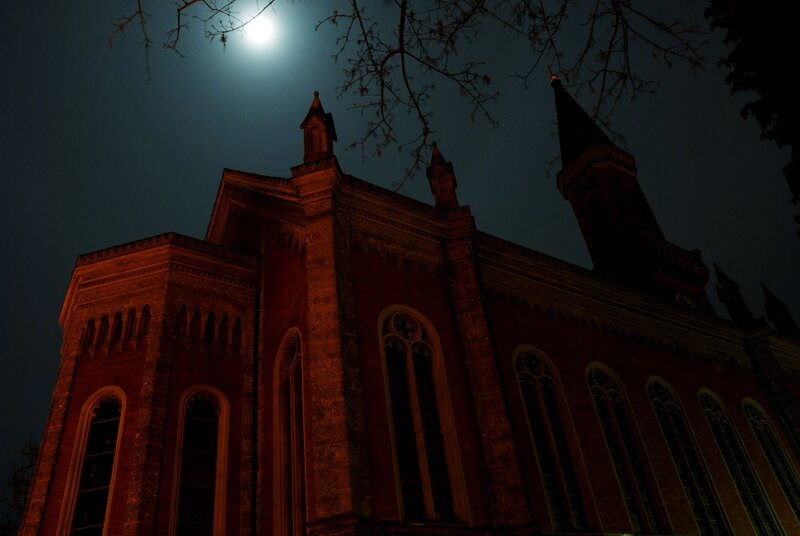 Church at night under moonlight