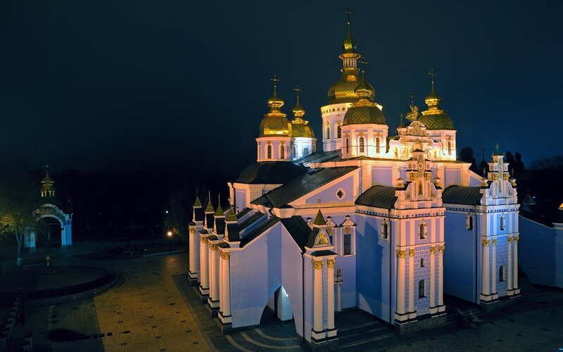 Church at night with golden domes