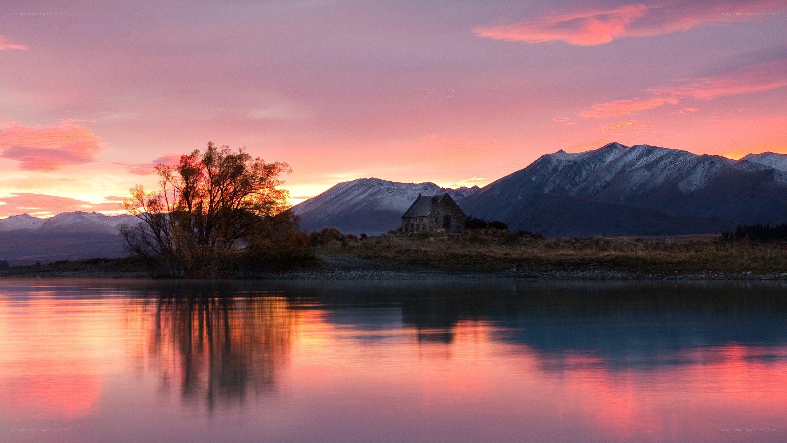 Church at sunset by a lake