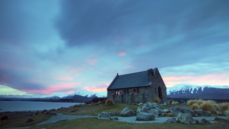 Church at sunset by a lake