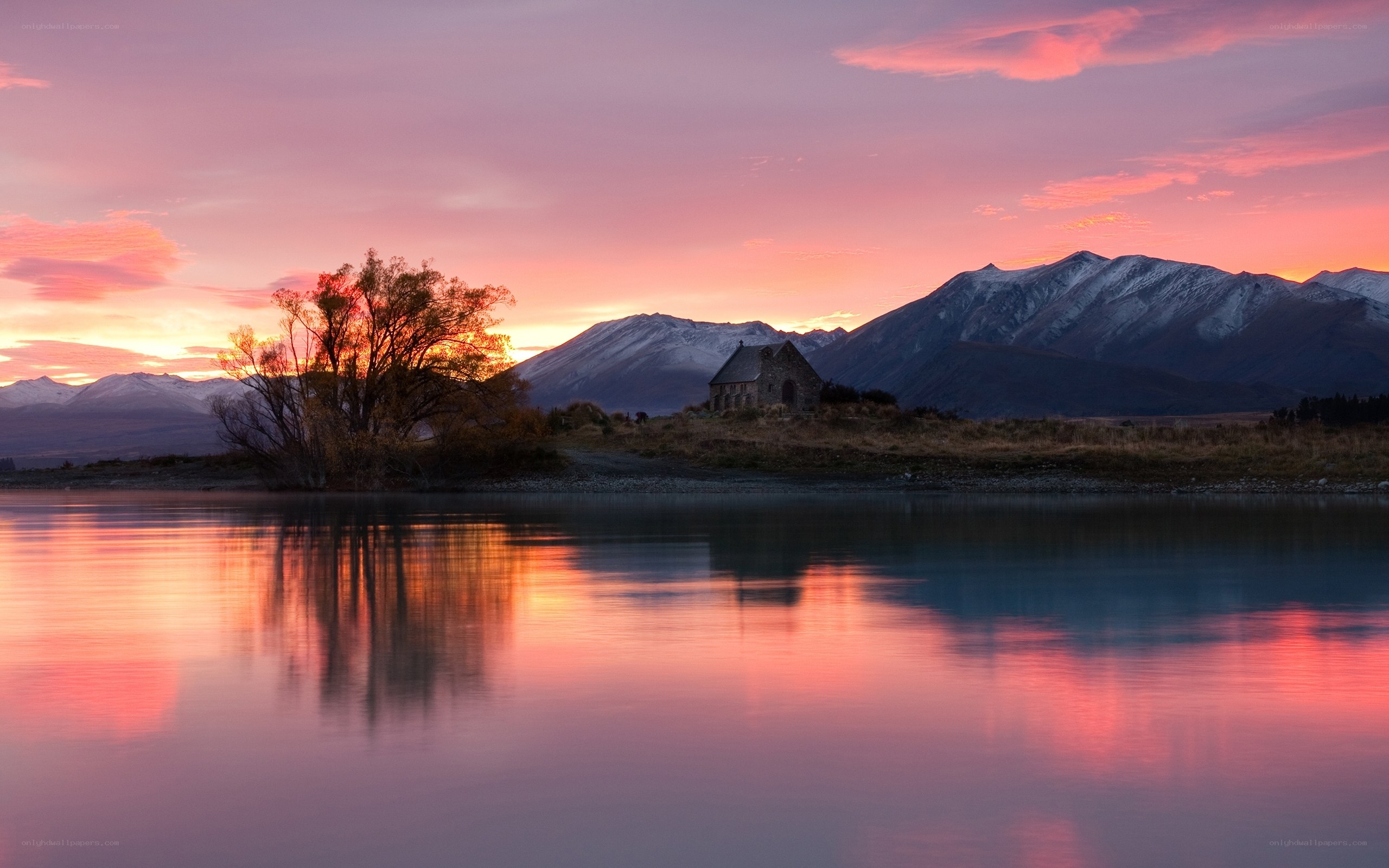 Church at sunset by a lake