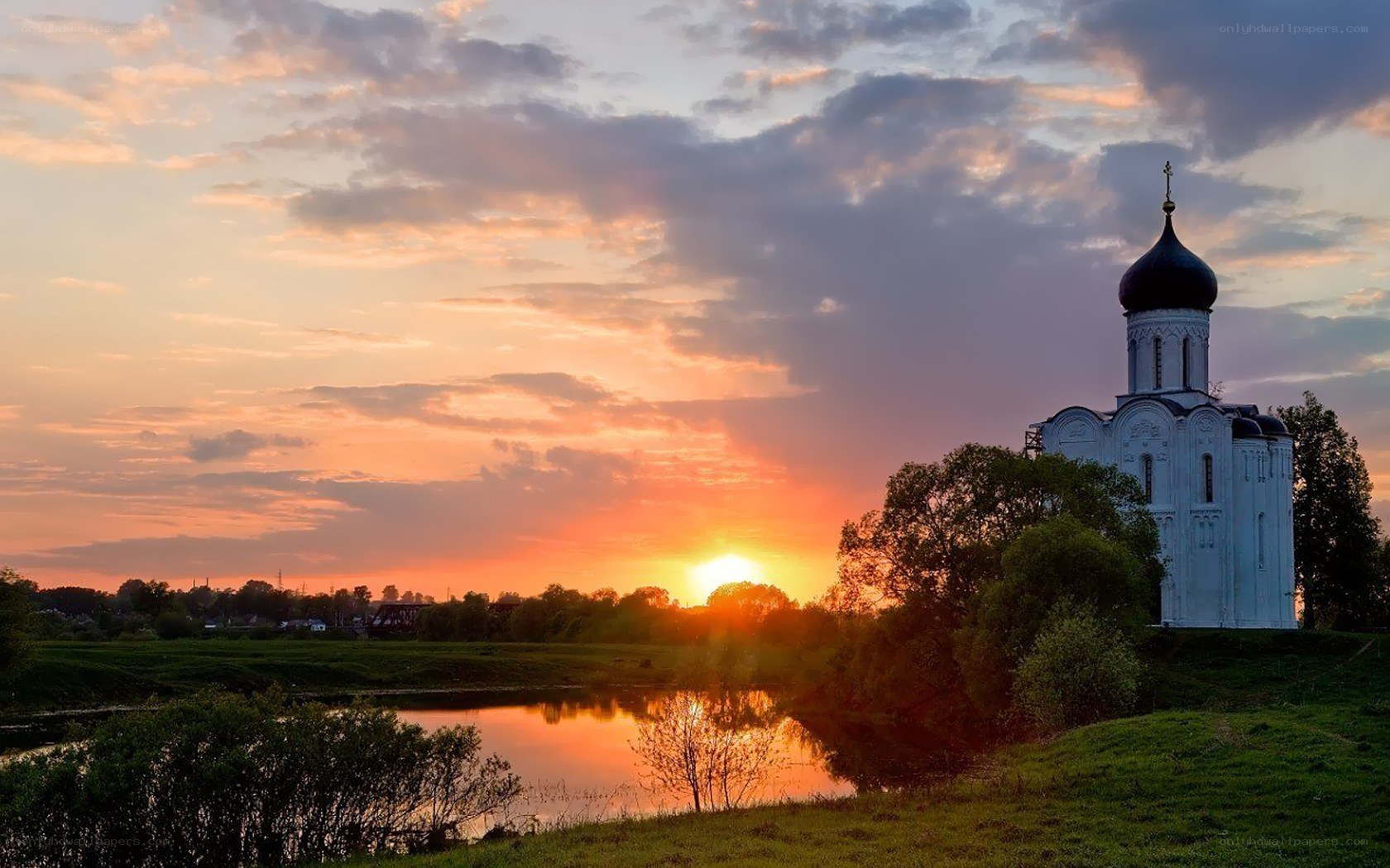 Church at sunset by the river